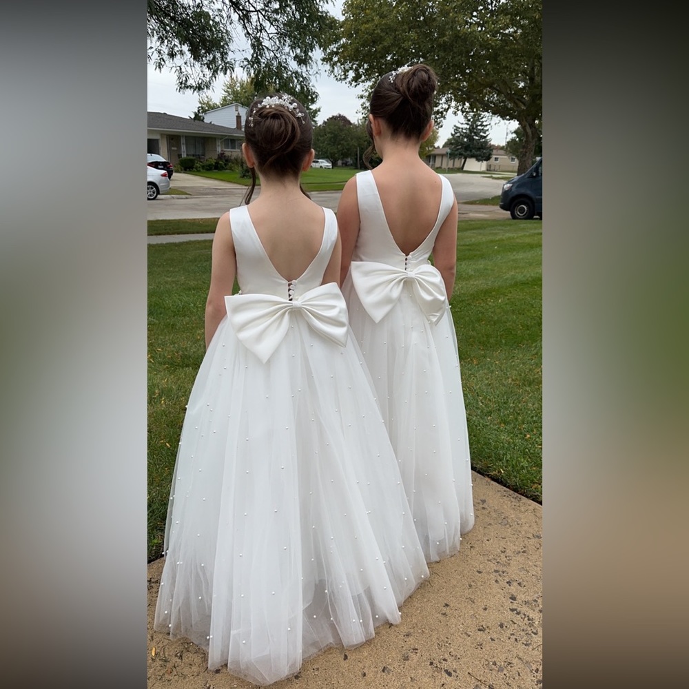 Flower girl dresses. I have 2 same exact dress different sizes.